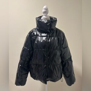 Shiny Black Puffer Jacket. Trendy, warm and water resistant. Size Small